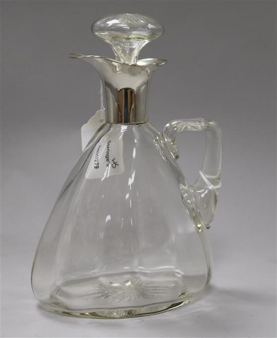 A George V silver mounted cut glass claret jug, 24cm